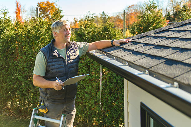 Professional Roof Replacement technician working in Ithaca, NY